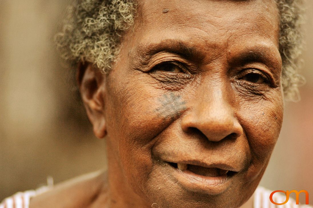 Photo of Vanuatu woman with a traditional tattoo on her face. Taken on the Vanuatu Island of Mota Lava by Amanda Fornal in December 2006.