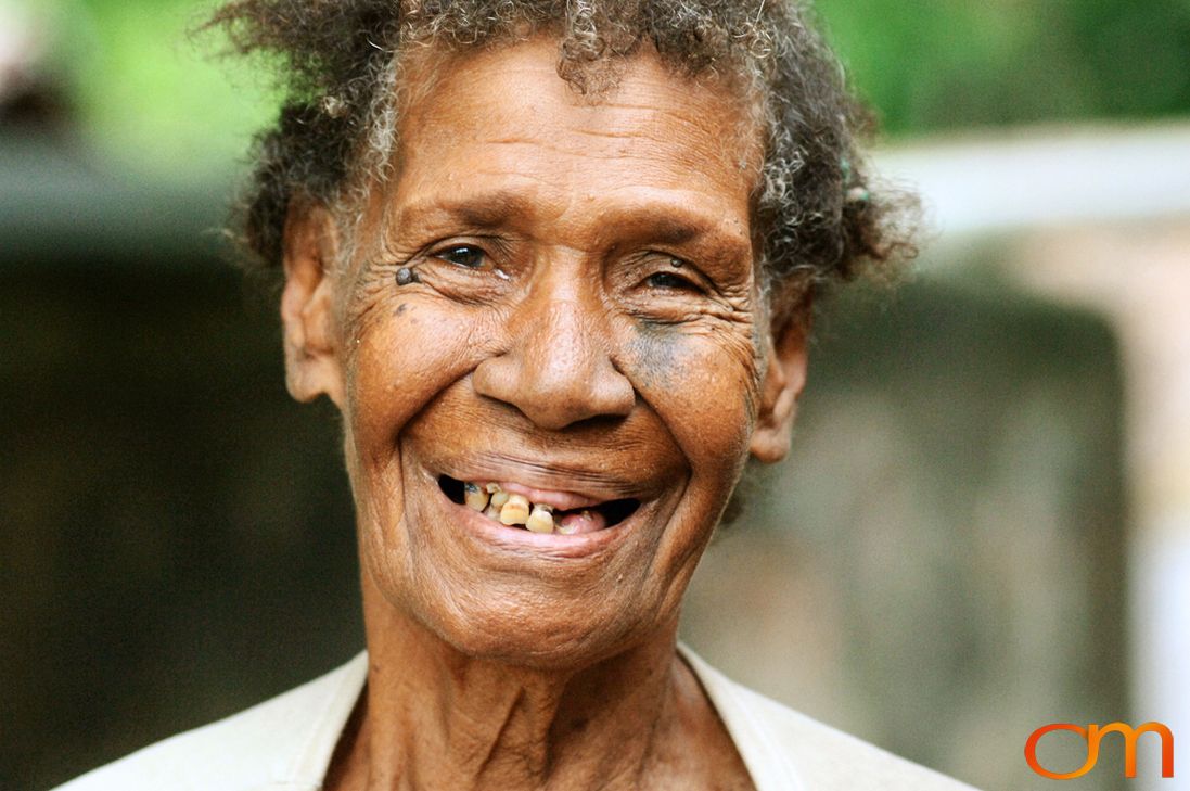 Photo of Vanuatu woman with a traditional tattoo on her face. Taken on the Vanuatu Island of Mota Lava by Amanda Fornal in December 2006.