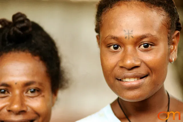 Photo of Vanuatu woman with a traditional tattoo on her face. Taken on the Vanuatu Island of Mota Lava by Amanda Fornal in December 2006.