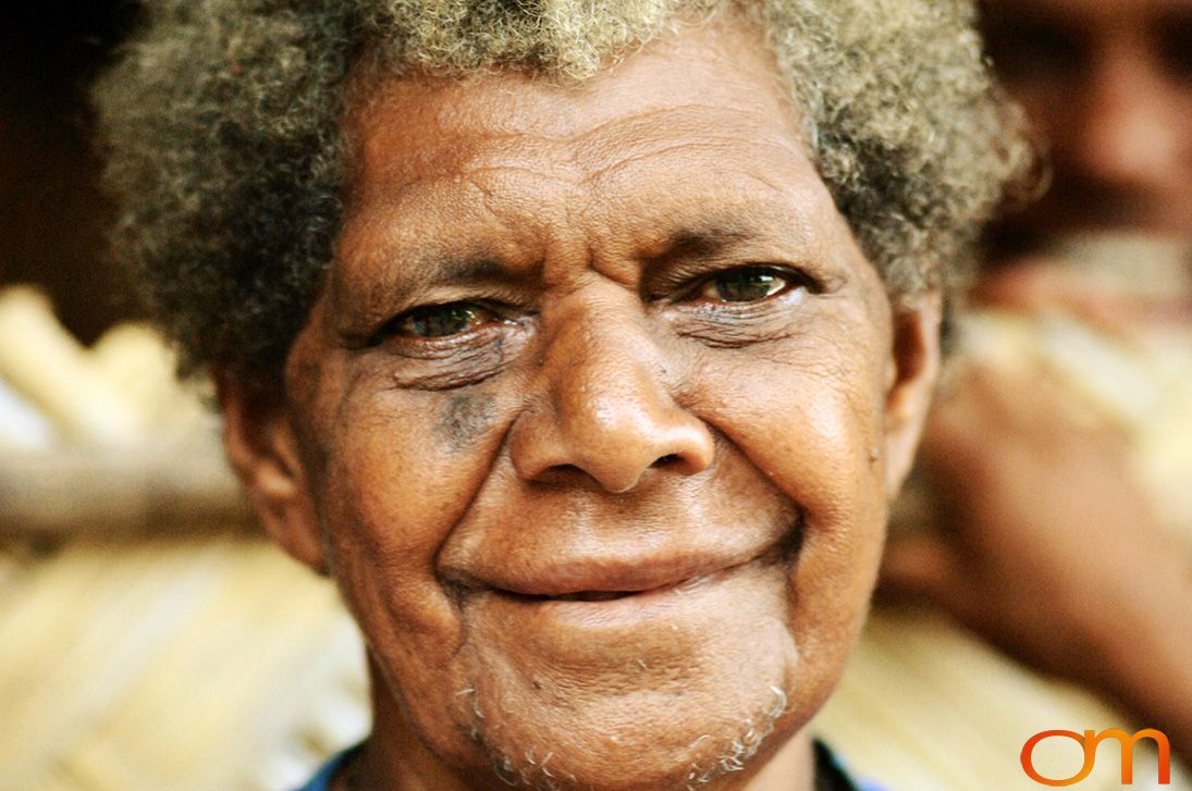 Photo of Vanuatu woman with a traditional tattoo on her face. Taken on the Vanuatu Island of Mota Lava by Amanda Fornal in December 2006.